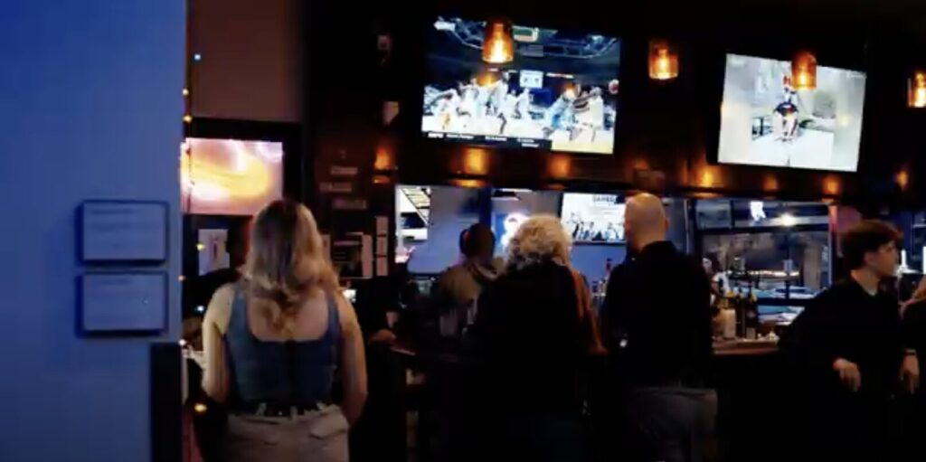 Check out the top 10 reasons to visit and enjoy the ultimate game day sports bar experience and why it's better than watching at home!